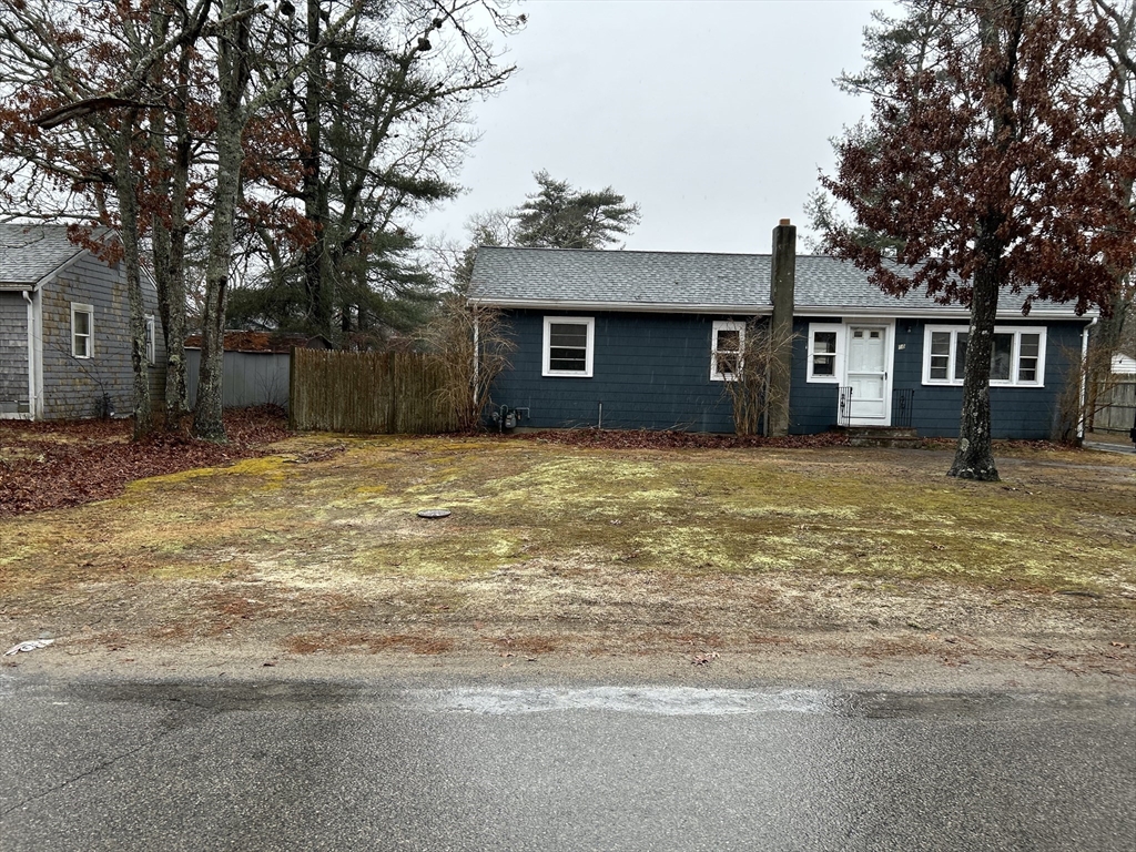 58 Cohasset Road Wareham, MA 02532 - Photo 1 of 14 a house that has a tree in front of it