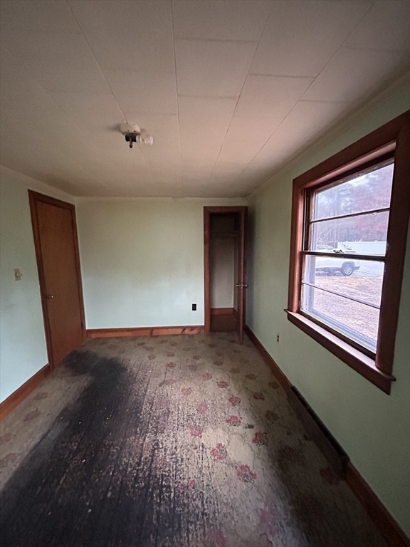 58 Cohasset Road Wareham, MA 02532 - Photo 6 of 14 a view of an empty room and window