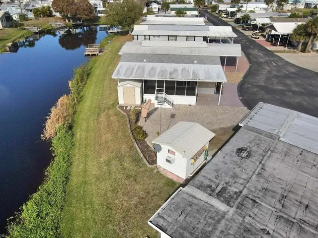 an aerial view of a house with outdoor space