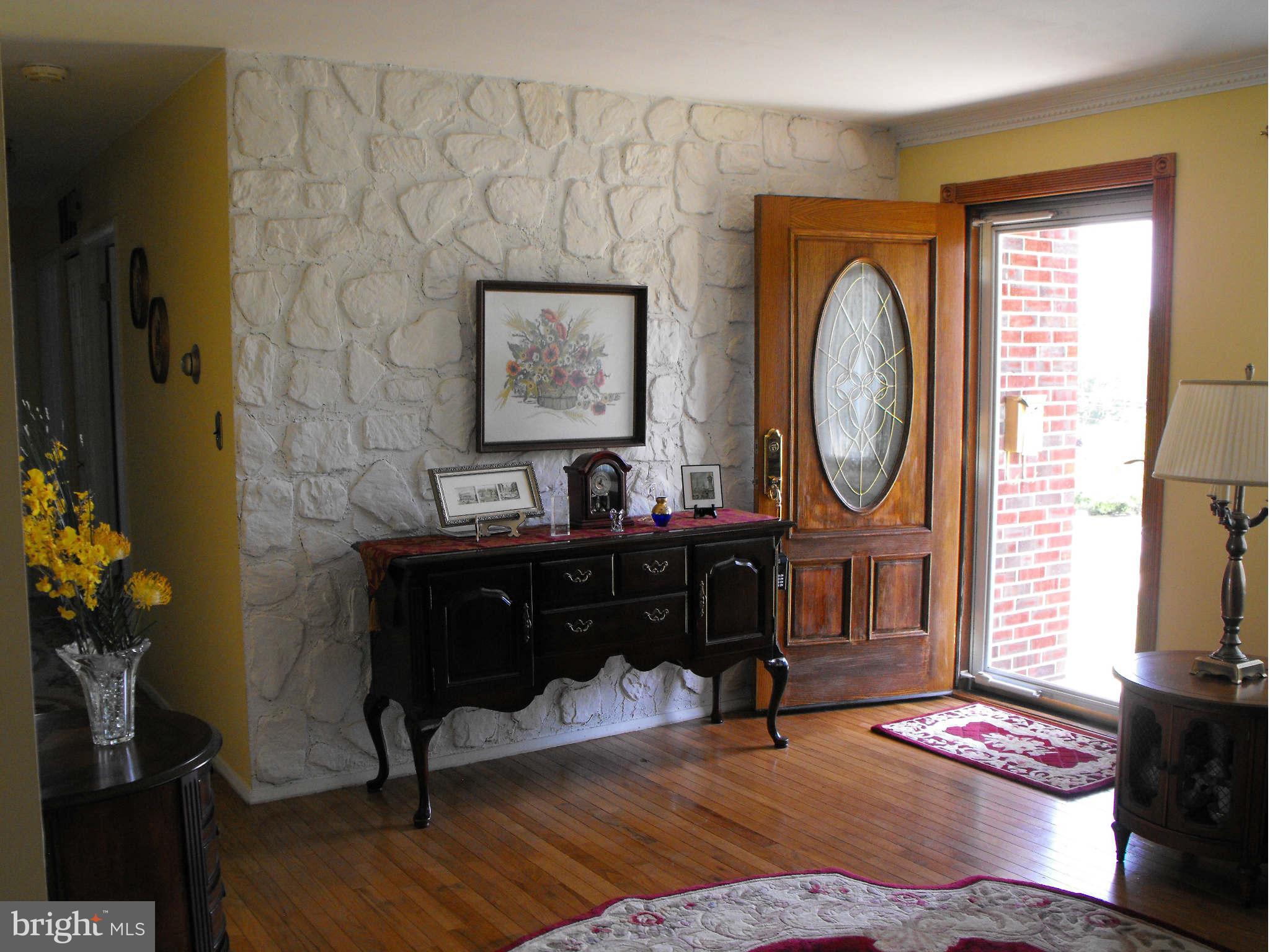 1524 National Road Baltimore, MD 21237 - Photo 2 of 21 Entry With Hardwoods To Living Room