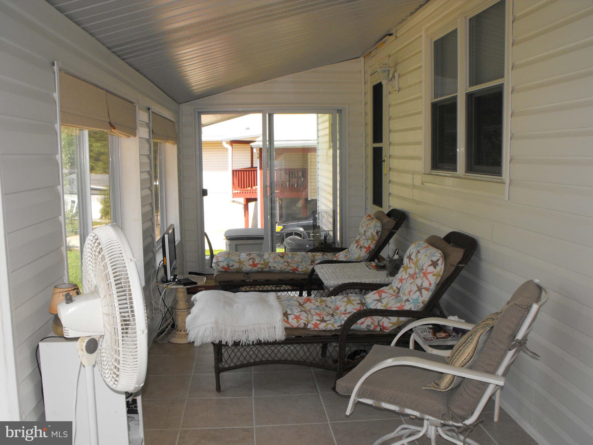 1524 National Road Baltimore, MD 21237 - Photo 9 of 21 Sunroom off of Dinning Room and Kitchen