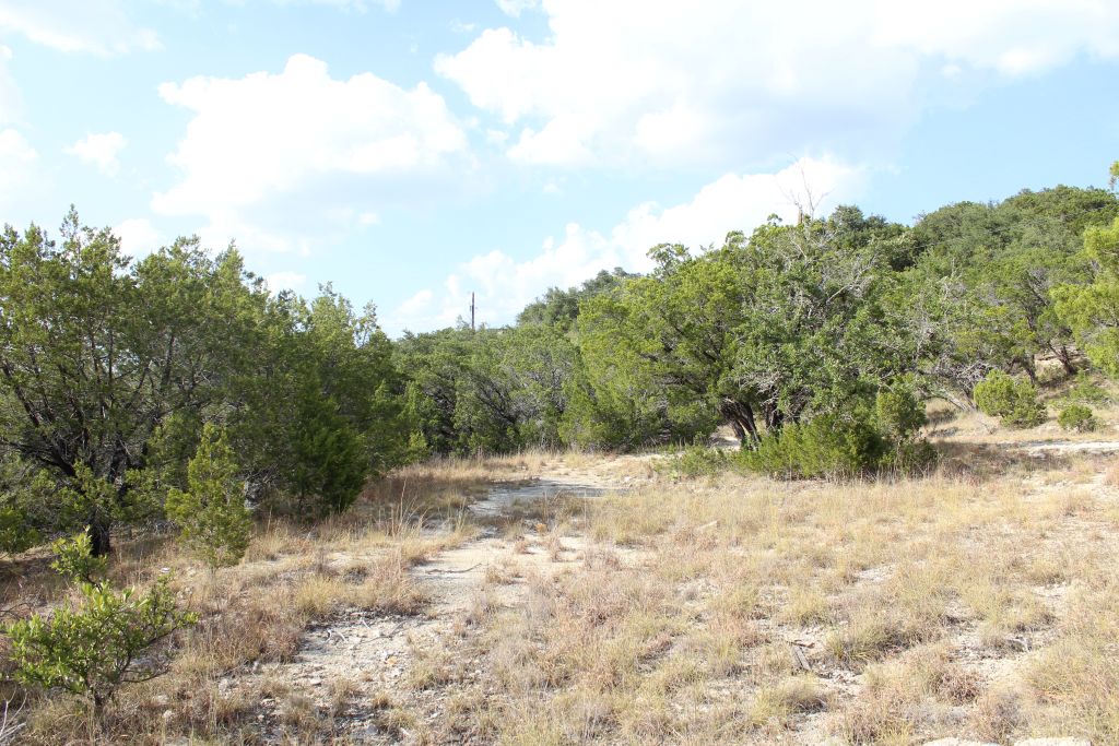 28808 Rim Rock Road Marble Falls, TX 78654 - Photo 3 of 15 Upper level main home site of our Lots