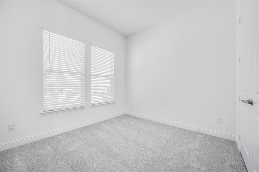 526 Chatham Street Oak Point, TX 75068 - Photo 14 of 35 an empty room with a window