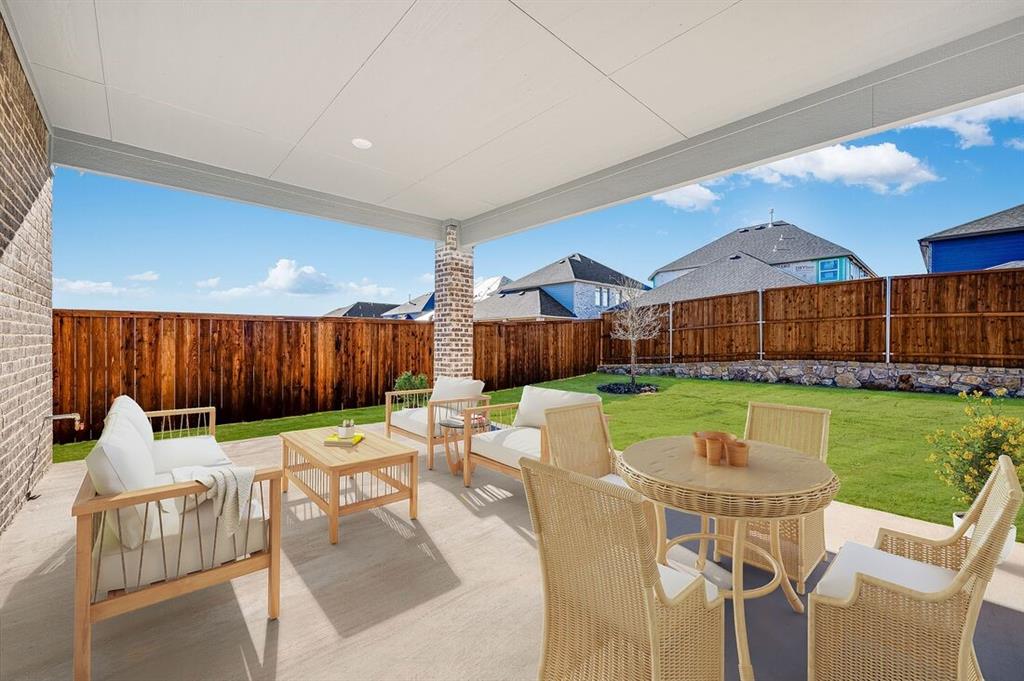 526 Chatham Street Oak Point, TX 75068 - Photo 30 of 35 a view of a patio with a yard