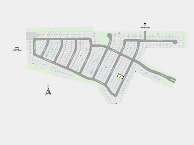 a view of a living room with furniture and floor to ceiling window