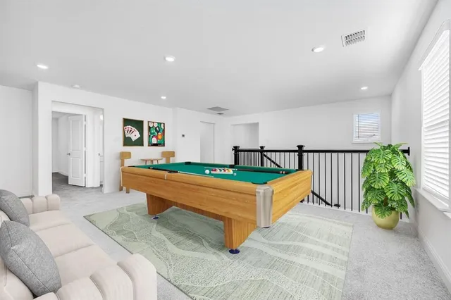 a bed room with a bed and a couch