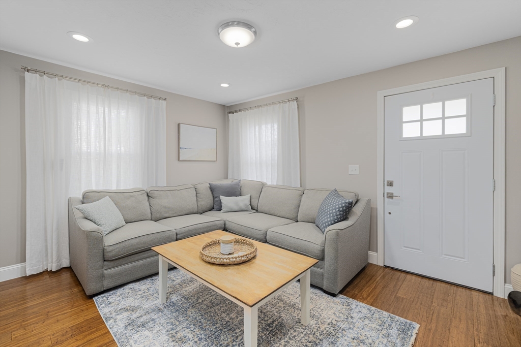 69 Denver Street Fall River, MA 02721 - Photo 21 of 35 a living room with furniture and a wooden floor