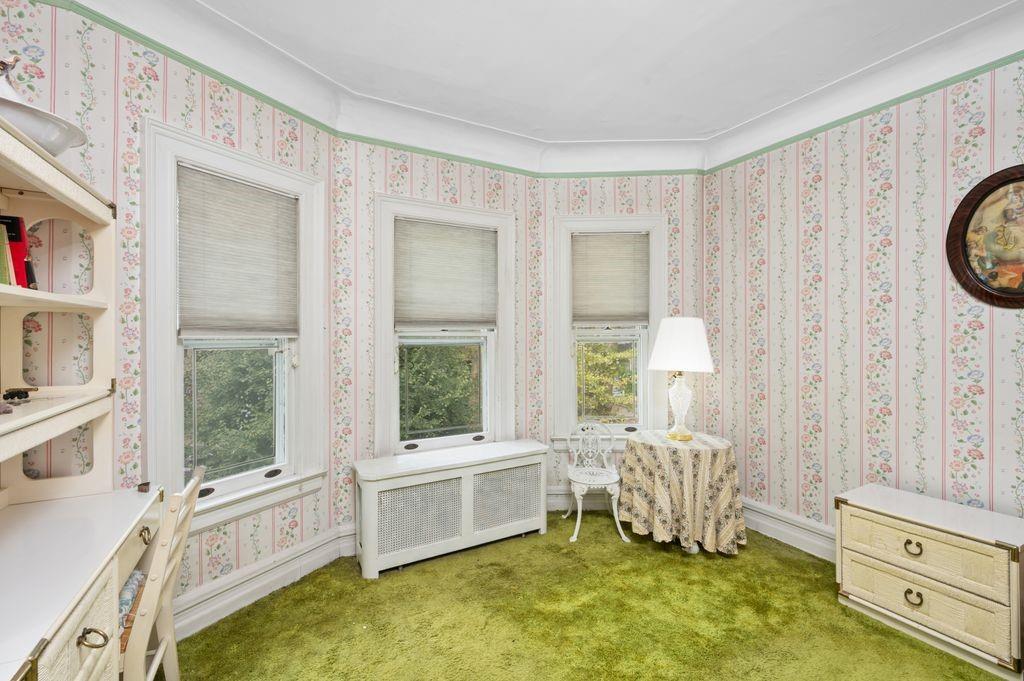 475 Argyle Road Brooklyn, NY 11218 - Photo 22 of 35 a spacious bedroom with a bed and a window