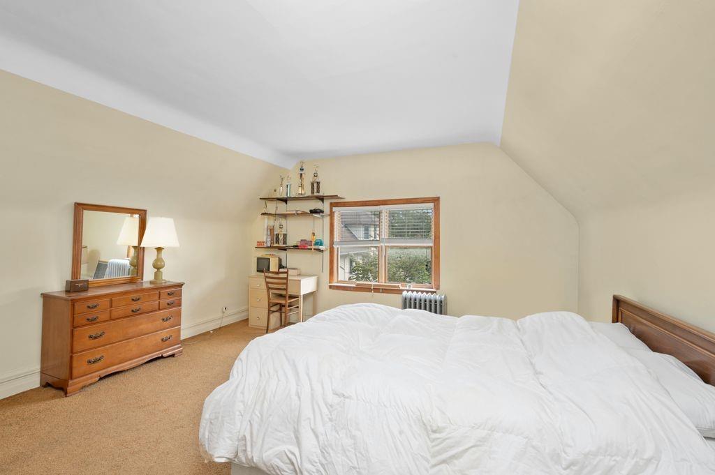 475 Argyle Road Brooklyn, NY 11218 - Photo 23 of 35 a bedroom with a bed and dresser