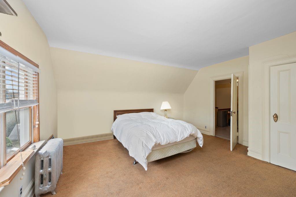 475 Argyle Road Brooklyn, NY 11218 - Photo 24 of 35 a bedroom with a bed and a cabinets