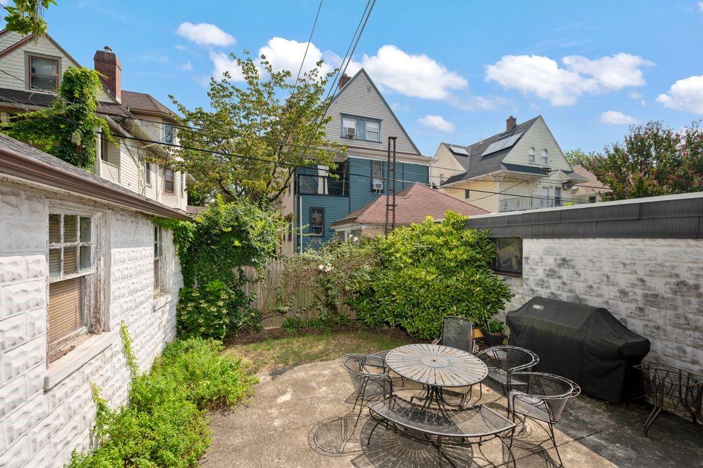 475 Argyle Road Brooklyn, NY 11218 - Photo 27 of 35 a view of a chairs and table in backyard of the house