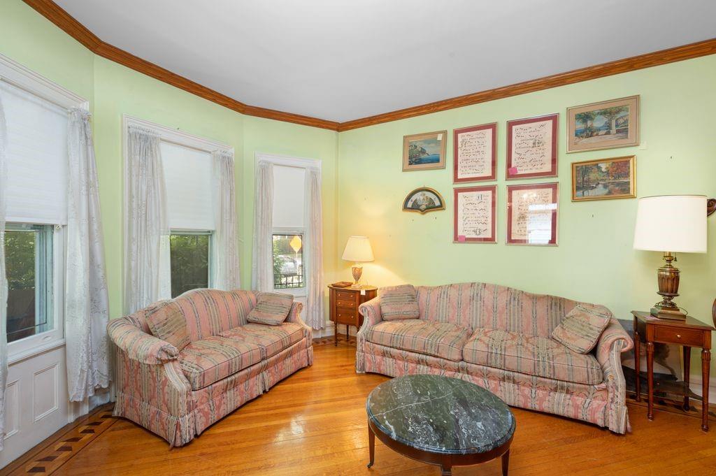 475 Argyle Road Brooklyn, NY 11218 - Photo 7 of 35 a living room with furniture and a large window