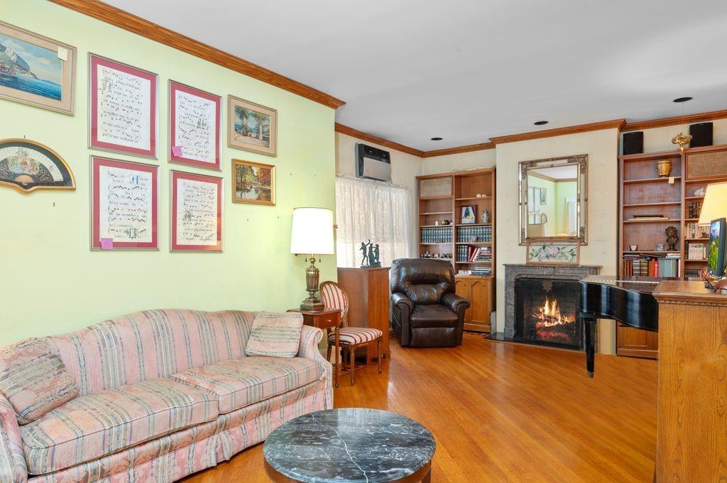 475 Argyle Road Brooklyn, NY 11218 - Photo 8 of 35 a living room with fireplace furniture and a floor
