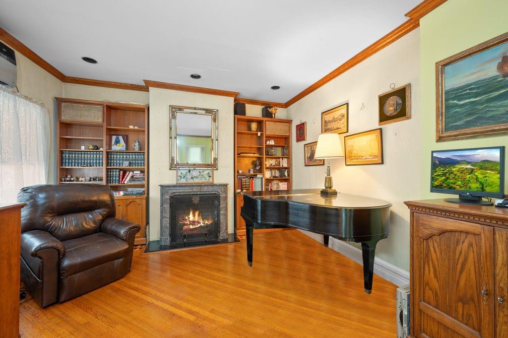 475 Argyle Road Brooklyn, NY 11218 - Photo 9 of 35 a living room with furniture and a fireplace
