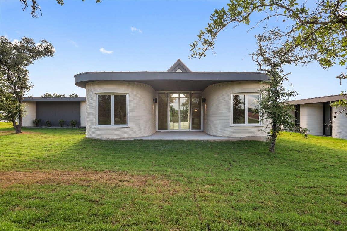 40 Peace Pipe Wimberley, TX 78676 - Photo 19 of 23 a front view of a house with a garden