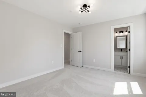 an empty room with a bathroom