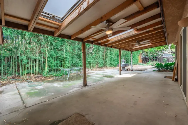 a view of backyard with green space