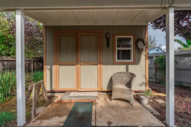 a front view of a house with patio