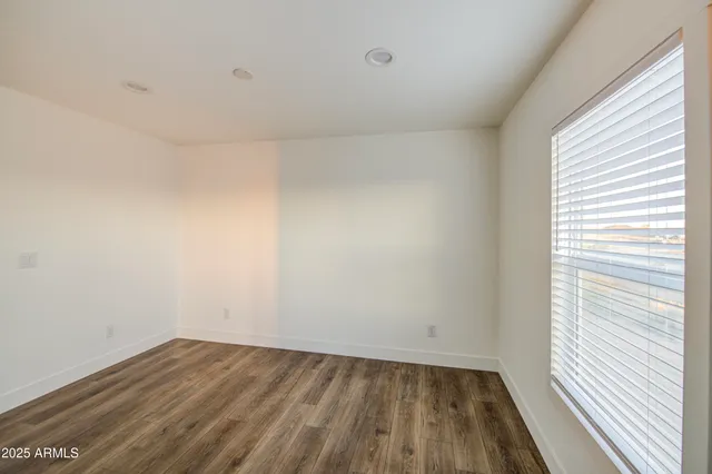 a kitchen with a sink stove and refrigerator