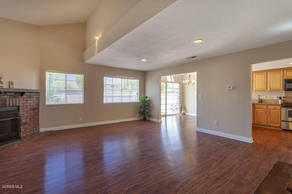 1990 Rory Lane, Unit 3 Simi Valley, CA 93063 - Photo 1 of 22 a view of an empty room with a window and wooden floor