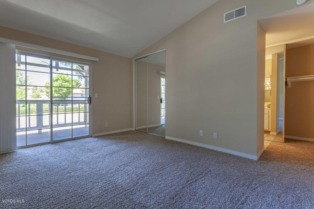 1990 Rory Lane, Unit 3 Simi Valley, CA 93063 - Photo 12 of 22 a view of an empty room with glass door