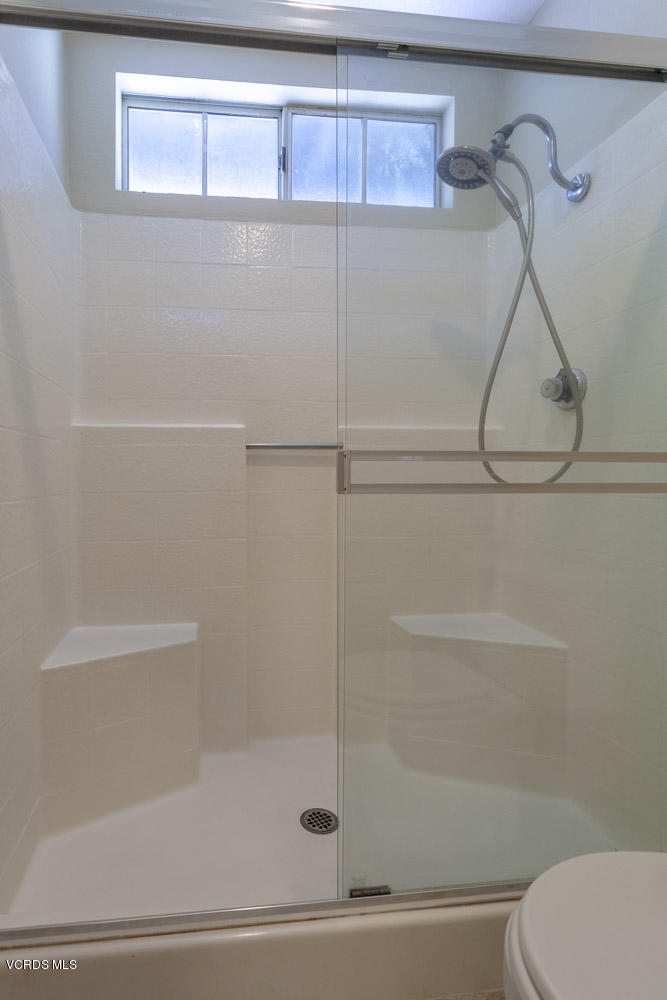 1990 Rory Lane, Unit 3 Simi Valley, CA 93063 - Photo 14 of 22 a bathroom with a shower and a toilet