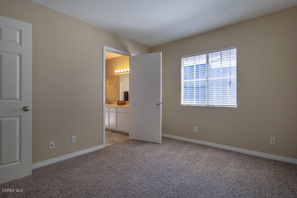 1990 Rory Lane, Unit 3 Simi Valley, CA 93063 - Photo 15 of 22 an empty room with windows