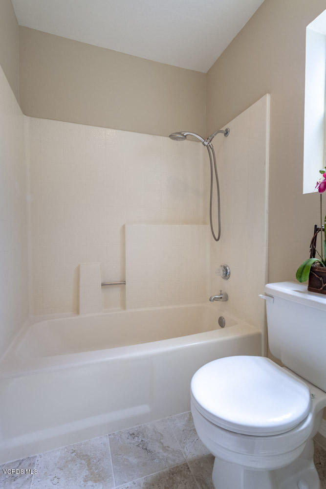 1990 Rory Lane, Unit 3 Simi Valley, CA 93063 - Photo 18 of 22 a bathroom with a toilet and a bathtub
