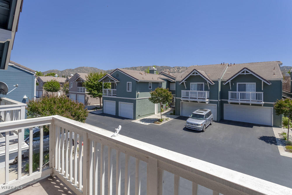 1990 Rory Lane, Unit 3 Simi Valley, CA 93063 - Photo 19 of 22 a front view of house with yard outdoor seating and barbeque oven