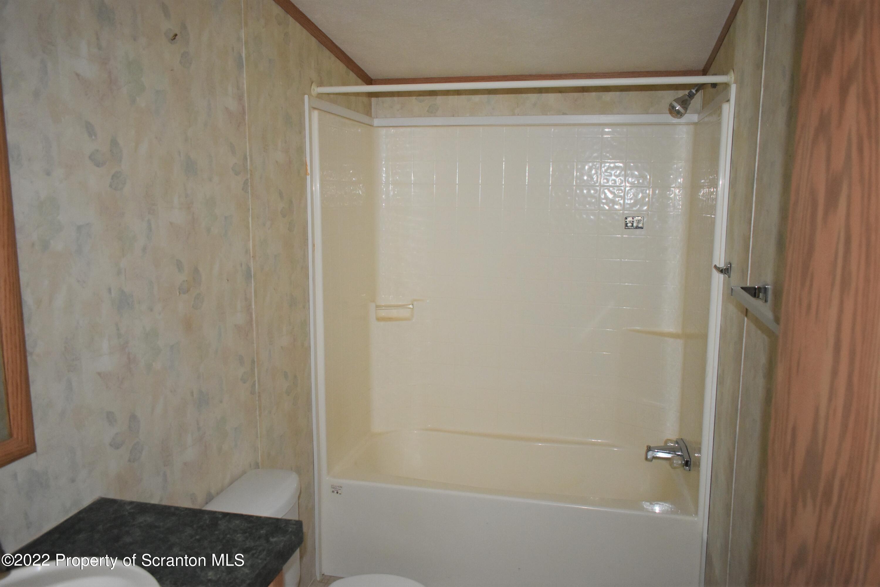 940 Nowlan Road Port Crane, NY 13833 - Photo 11 of 12 a bathroom with a shower