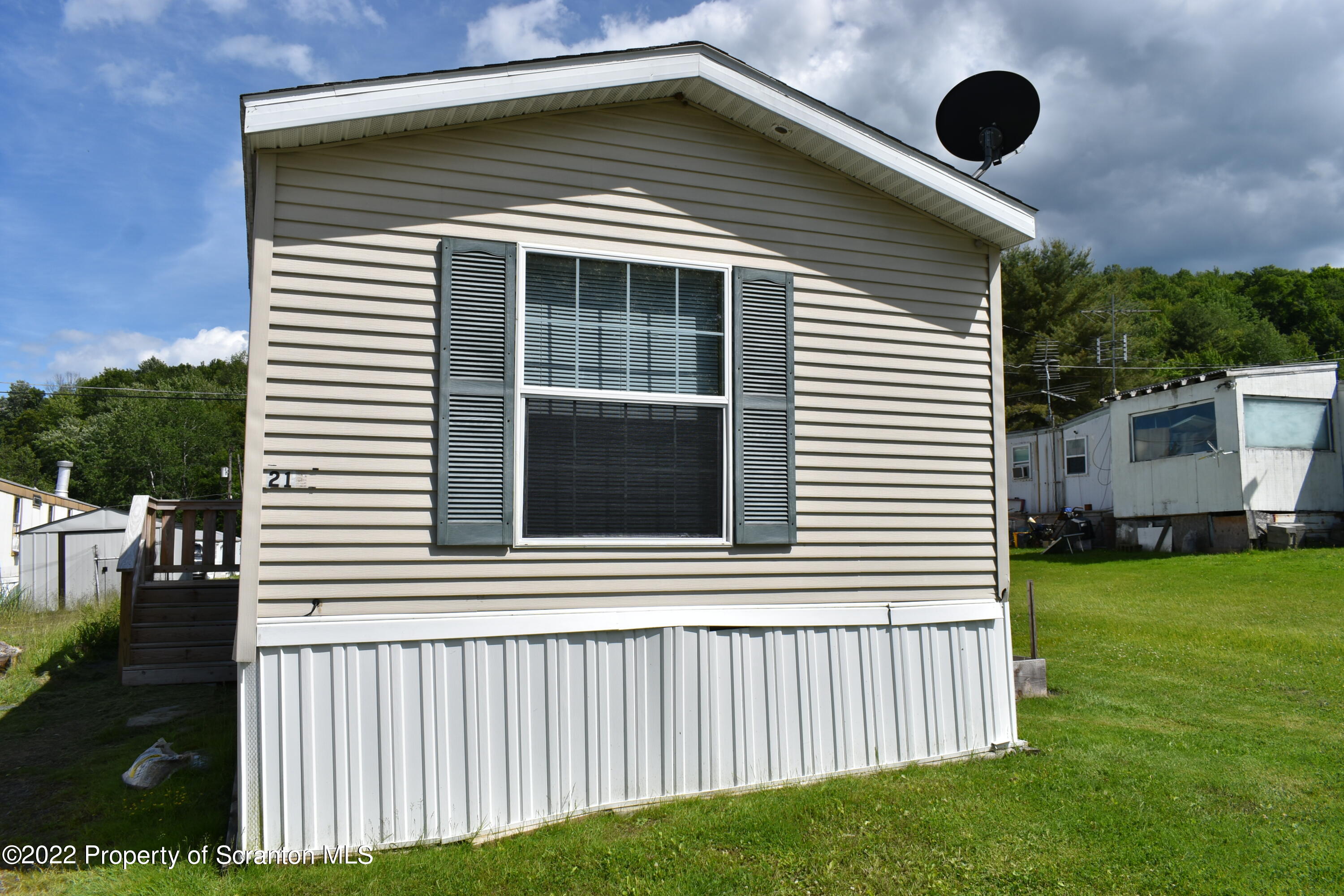 940 Nowlan Road Port Crane, NY 13833 - Photo 2 of 12 a view of a house with backyard and porch