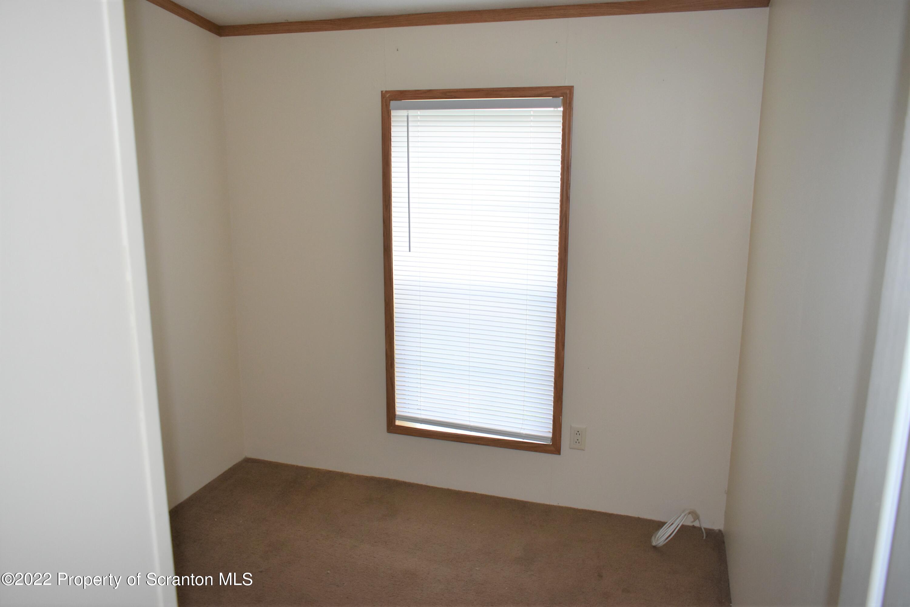 940 Nowlan Road Port Crane, NY 13833 - Photo 6 of 12 a view of an empty room