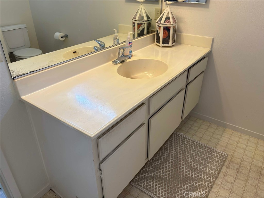 2483 Country Santa Maria, CA 93455 - Photo 14 of 19 a bathroom with a sink and a vanity