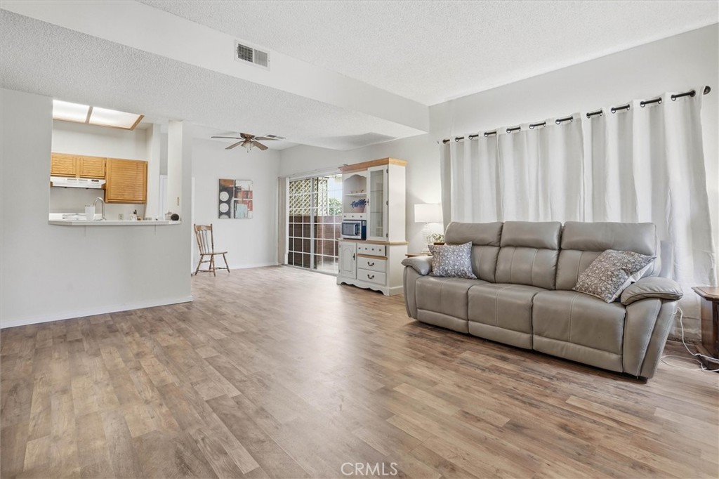 2483 Country Santa Maria, CA 93455 - Photo 4 of 19 a living room with furniture and a wooden floor