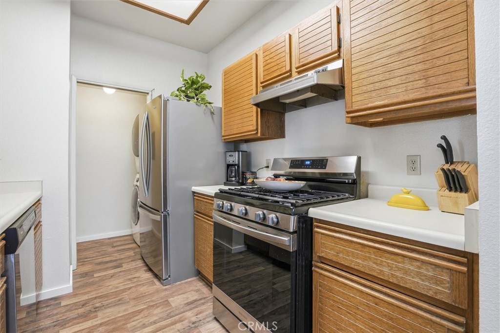 2483 Country Santa Maria, CA 93455 - Photo 8 of 19 a kitchen with a stove and a refrigerator