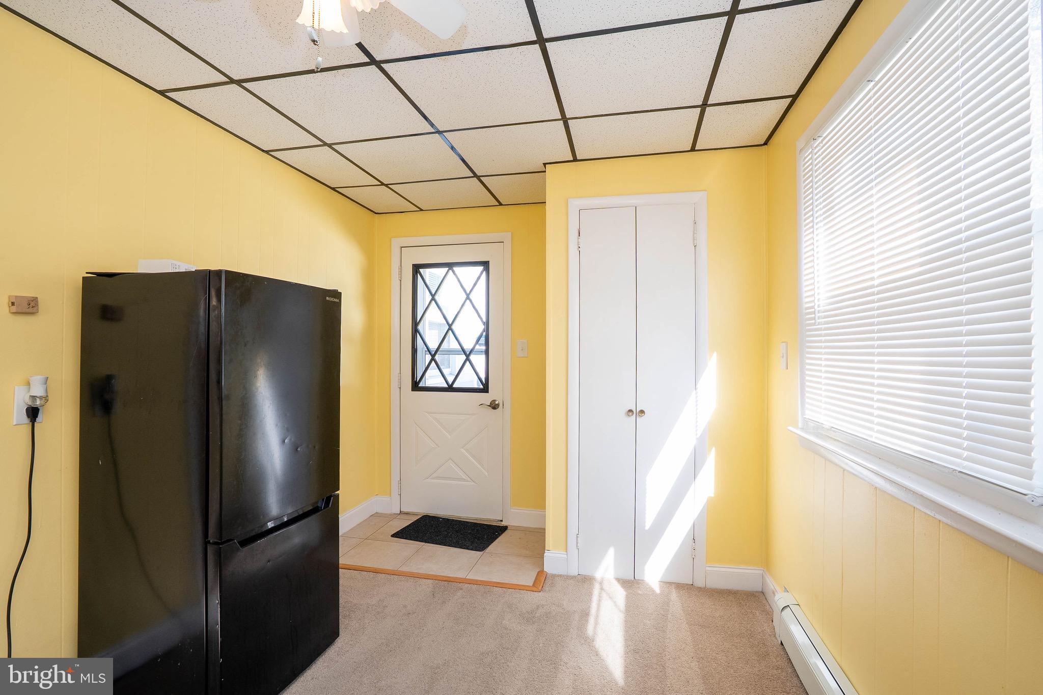 135 Keswick Avenue Ewing, NJ 08638 - Photo 12 of 22 a refrigerator freezer sitting inside of a kitchen