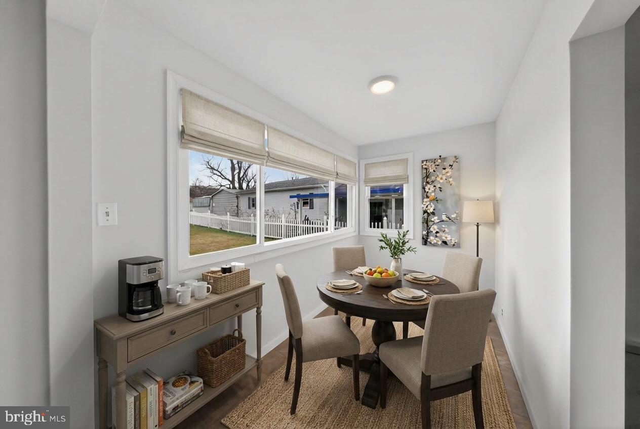 68 Saxton Road Dover, DE 19901 - Photo 13 of 24 a view of a dining room with furniture window and outside view