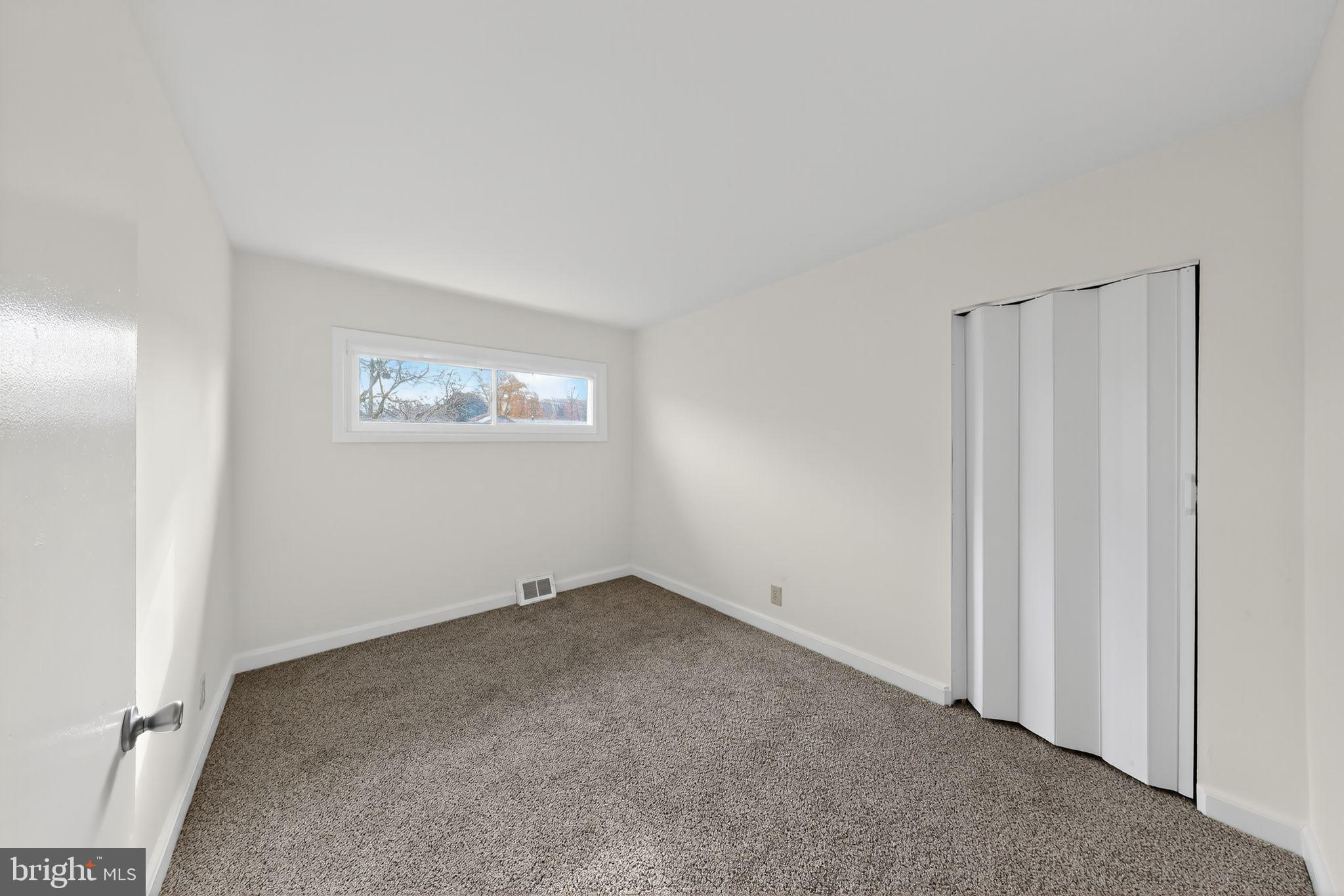 68 Saxton Road Dover, DE 19901 - Photo 18 of 24 an empty room with windows