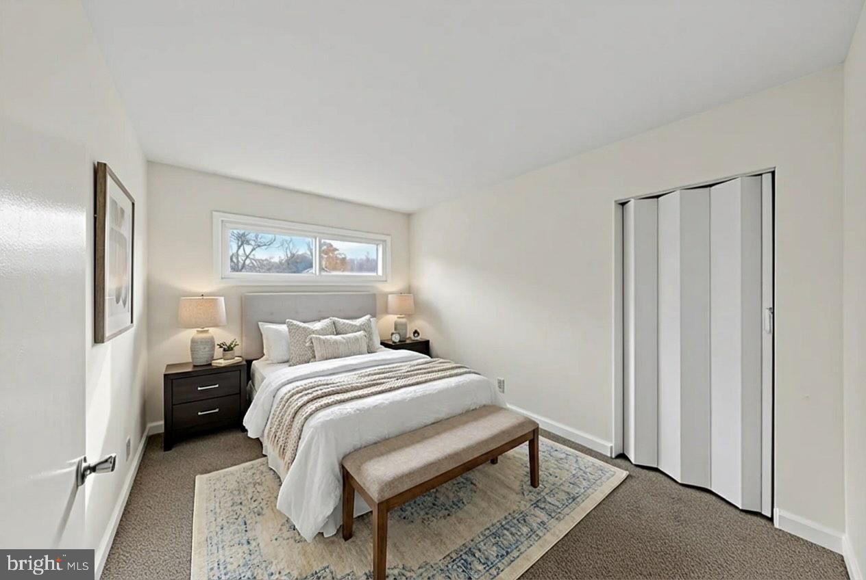 68 Saxton Road Dover, DE 19901 - Photo 19 of 24 a bedroom with a bed and a painting on the wall