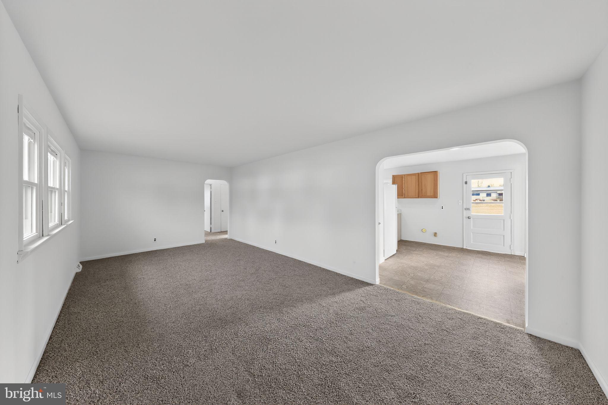 68 Saxton Road Dover, DE 19901 - Photo 6 of 24 an empty room with windows and closet