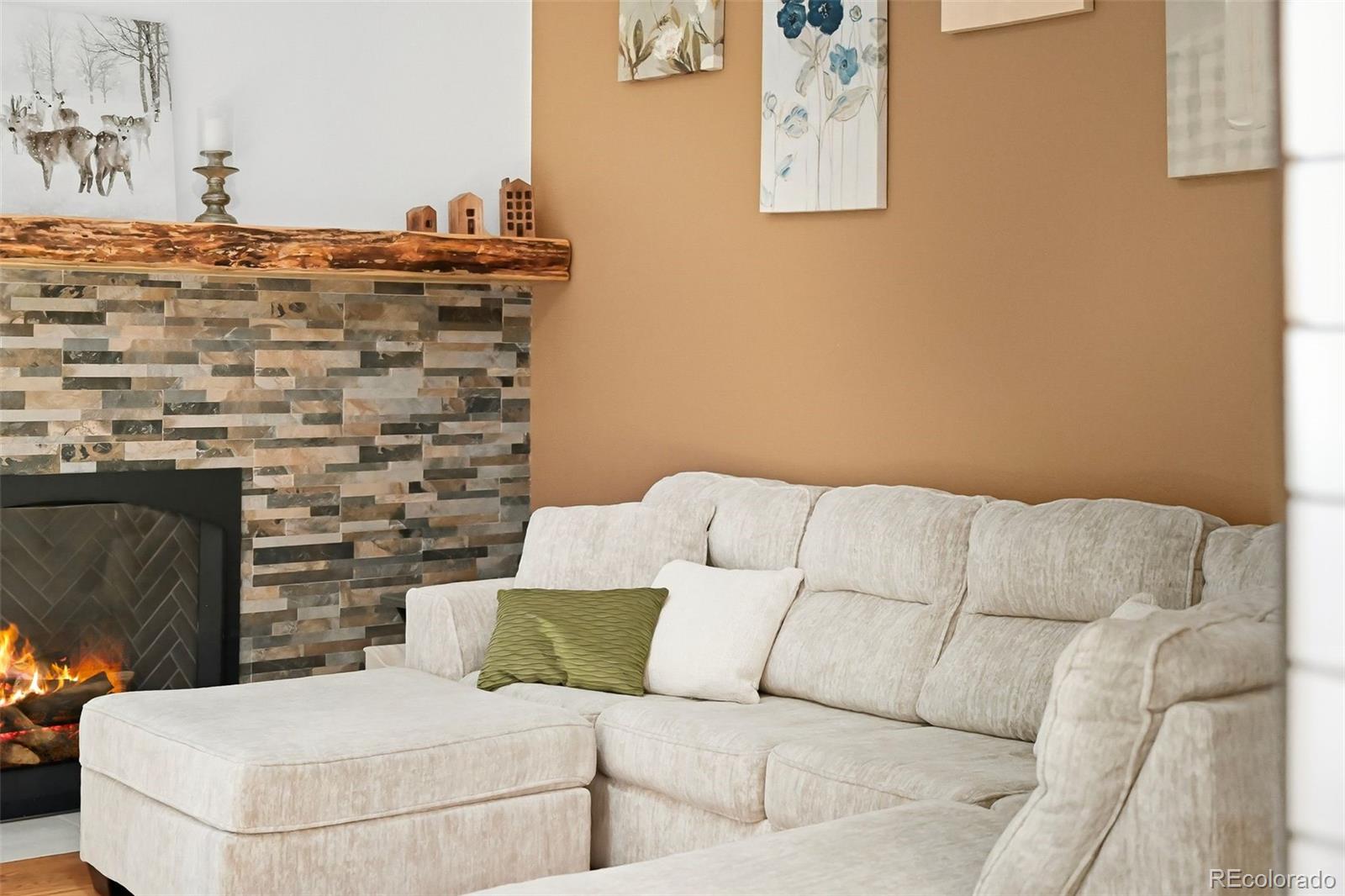 9372 Prairie View Drive Highlands Ranch, CO 80126 - Photo 15 of 50 a living room with a couch