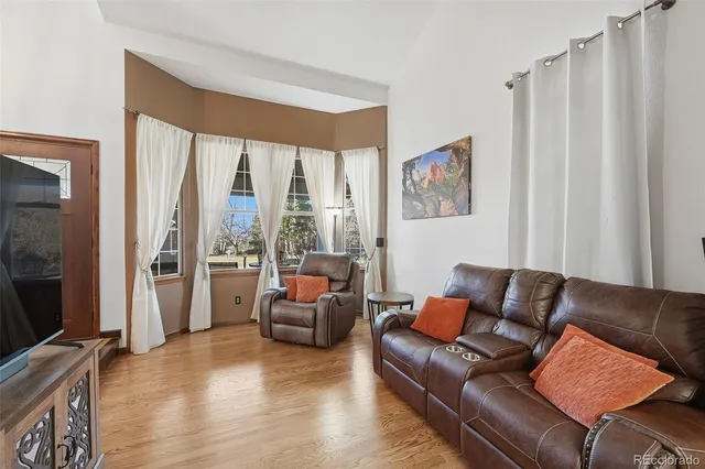 a bathroom with a bathtub and a window