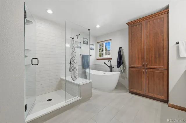 a bathroom with a sink and a shower