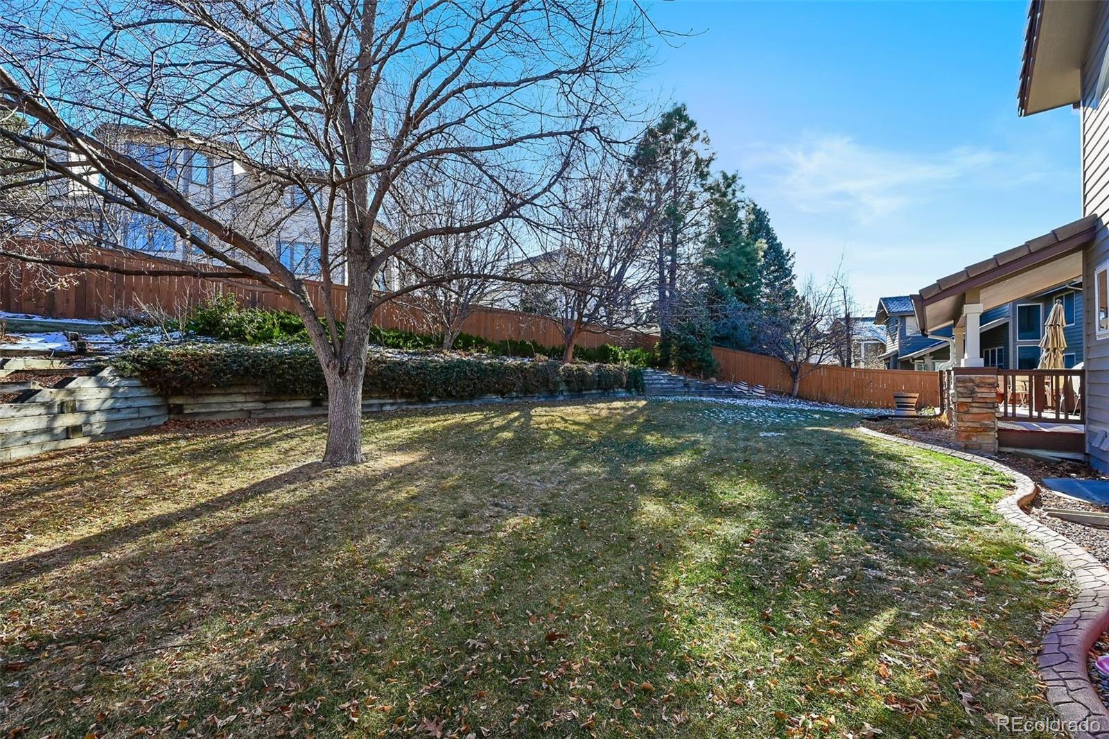 9372 Prairie View Drive Highlands Ranch, CO 80126 - Photo 43 of 50 a view of outdoor space with garden