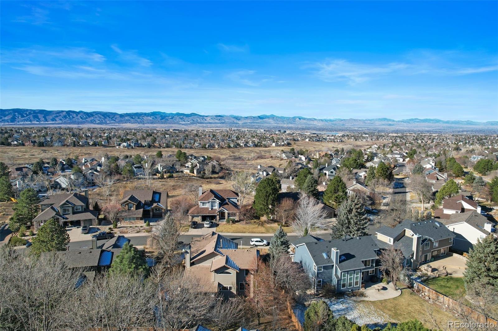 9372 Prairie View Drive Highlands Ranch, CO 80126 - Photo 49 of 50 an aerial view of a city with lots of residential buildings
