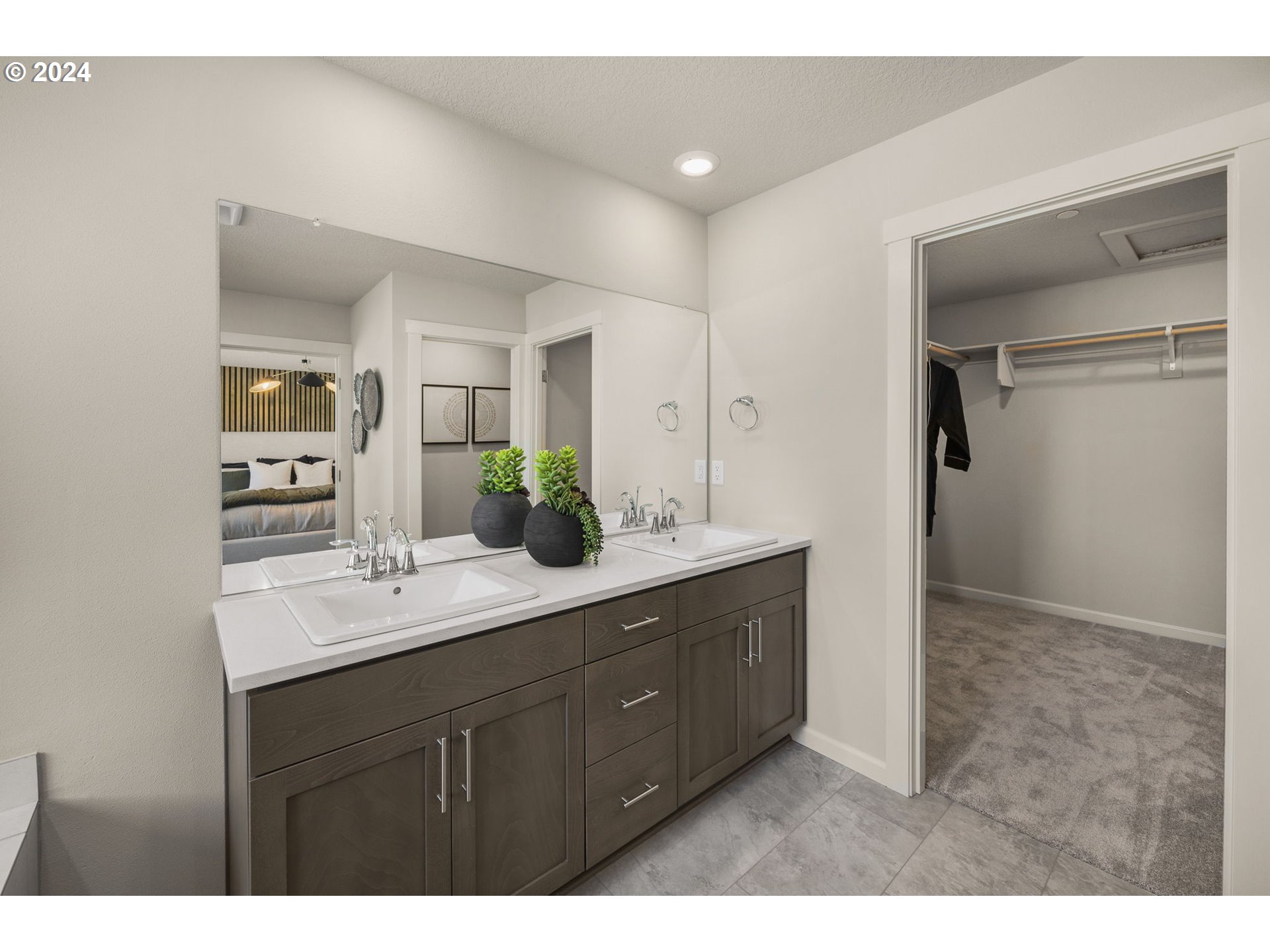 2735 South 9th Circle Ridgefield, WA 98642 - Photo 28 of 38 a bathroom with a sink and a mirror