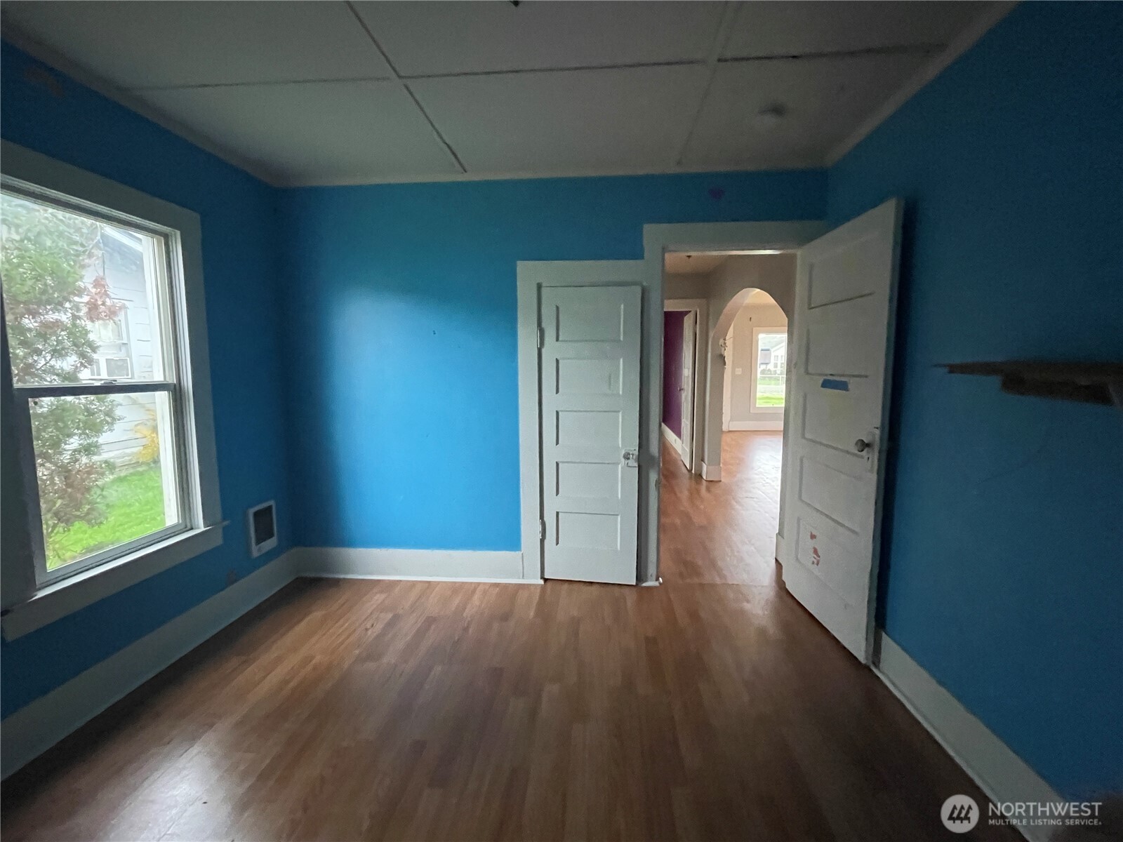154 Southwest 11th Street Chehalis, WA 98532 - Photo 11 of 29 a view of a room with wooden floor and a window