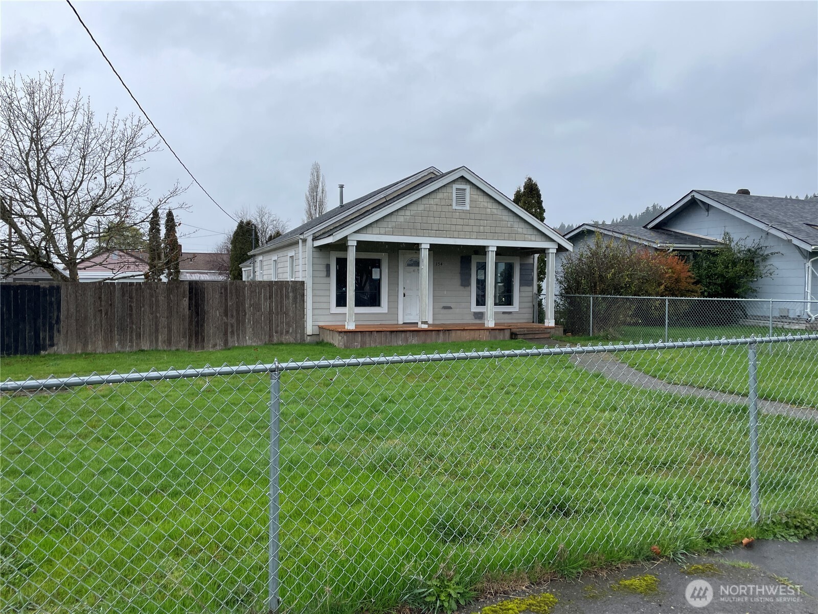 154 Southwest 11th Street Chehalis, WA 98532 - Photo 28 of 29 a front view of a house with garden