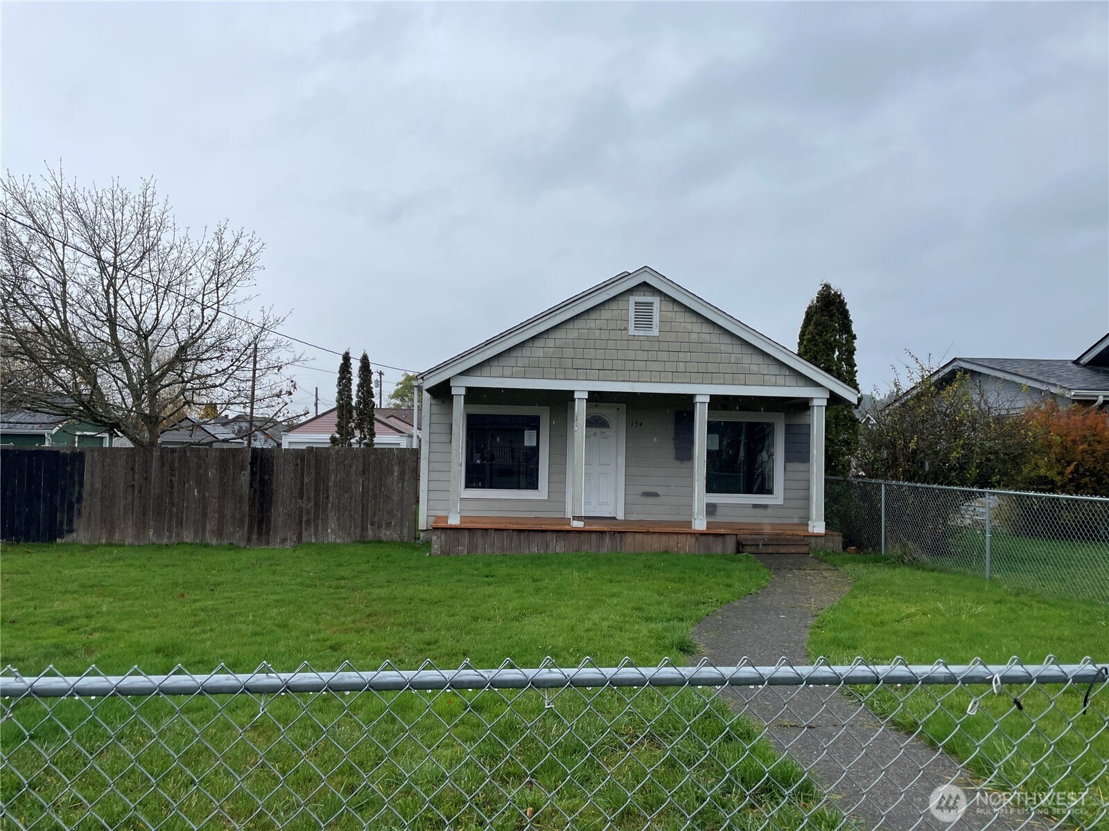 154 Southwest 11th Street Chehalis, WA 98532 - Photo 29 of 29 a front view of a house with a yard