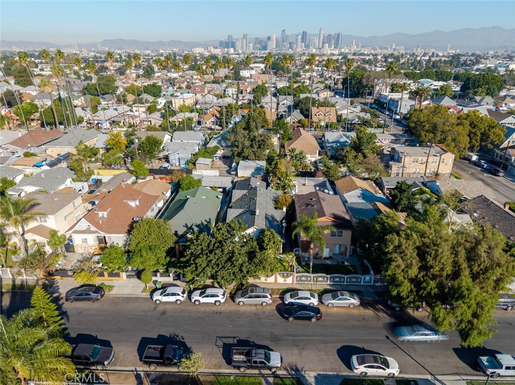 811 East 43rd Place Los Angeles, CA 90011 - Photo 2 of 31 an aerial view of residential houses with outdoor space